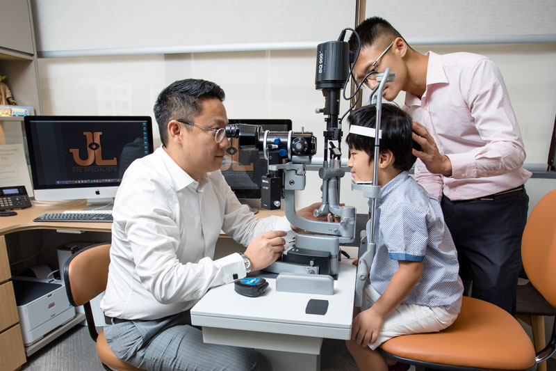 Dr Jimmy Lim JL Eye Specialists Clinic in Singapore Myopia Control Service Child Check-up with team