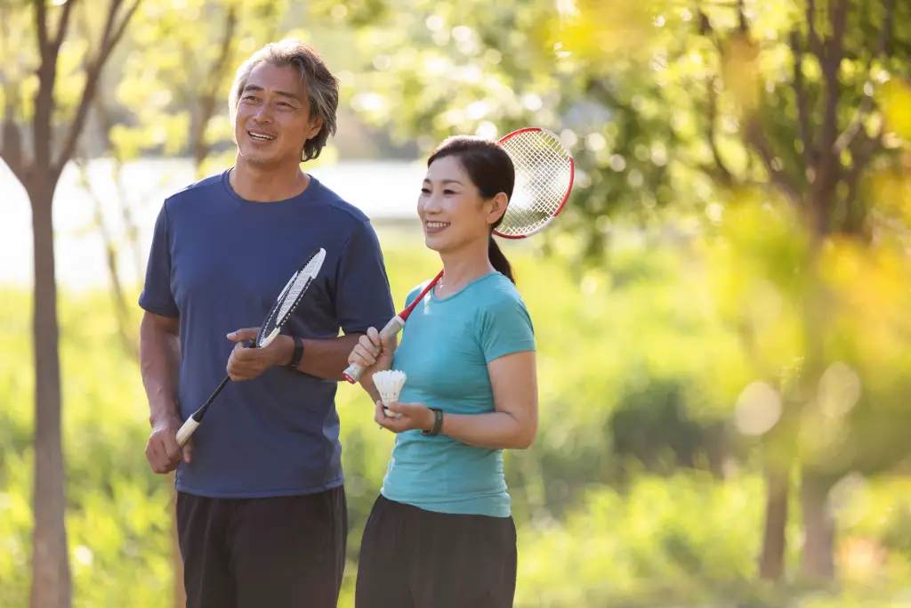 Adults enjoying the outdoors with clear vision after cataract surgery recovery.